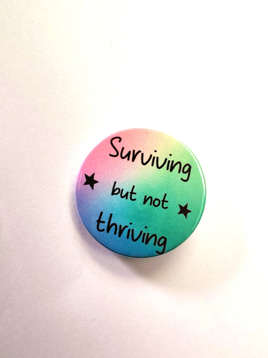 Surviving but not thriving badge set